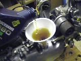 0.7 litre or 1 1/4 pints of SAE90 gearbox oil